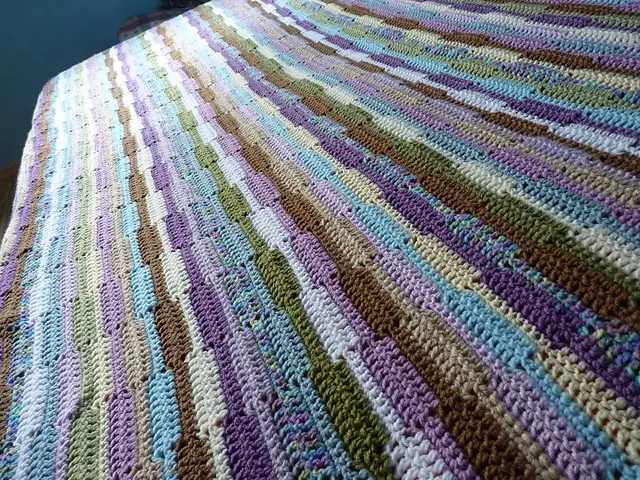 [Free Pattern] This Gorgeous Crochet Ribbon Afghan Looks Like A Beautiful Piece Quilt