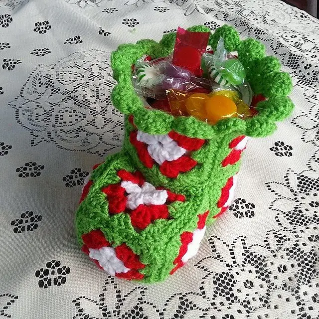 [Free Pattern] Cute Crochet Christmas Bootie Candy Dish To Be Filled With Christmas Treats