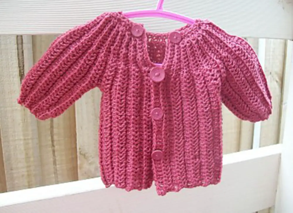 [Free Pattern] This One Piece Wonder Baby Sweater Pattern Is Brilliant!