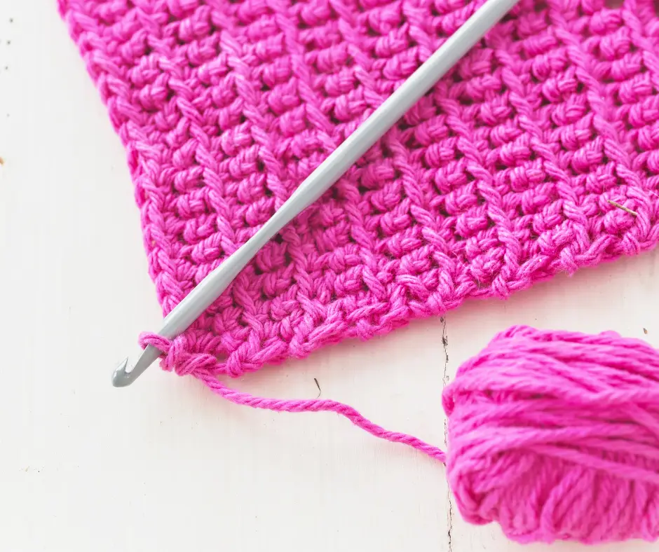 To fasten off in crochet or knitting, you'll need to follow these simple steps: work up to the last stitch, cut the yarn leaving a tail, thread the yarn ends through the next stitch, and pull tight.