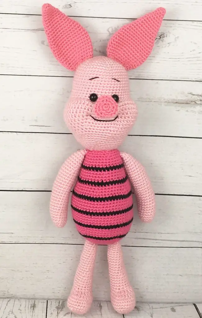 Craft a cute amigurumi pig toy with this crochet pattern! Designed to simplify every step, from the piglet's ears down to its legs. Enjoy crafting with easy to follow instructions. Get this complimentary free pattern now!
