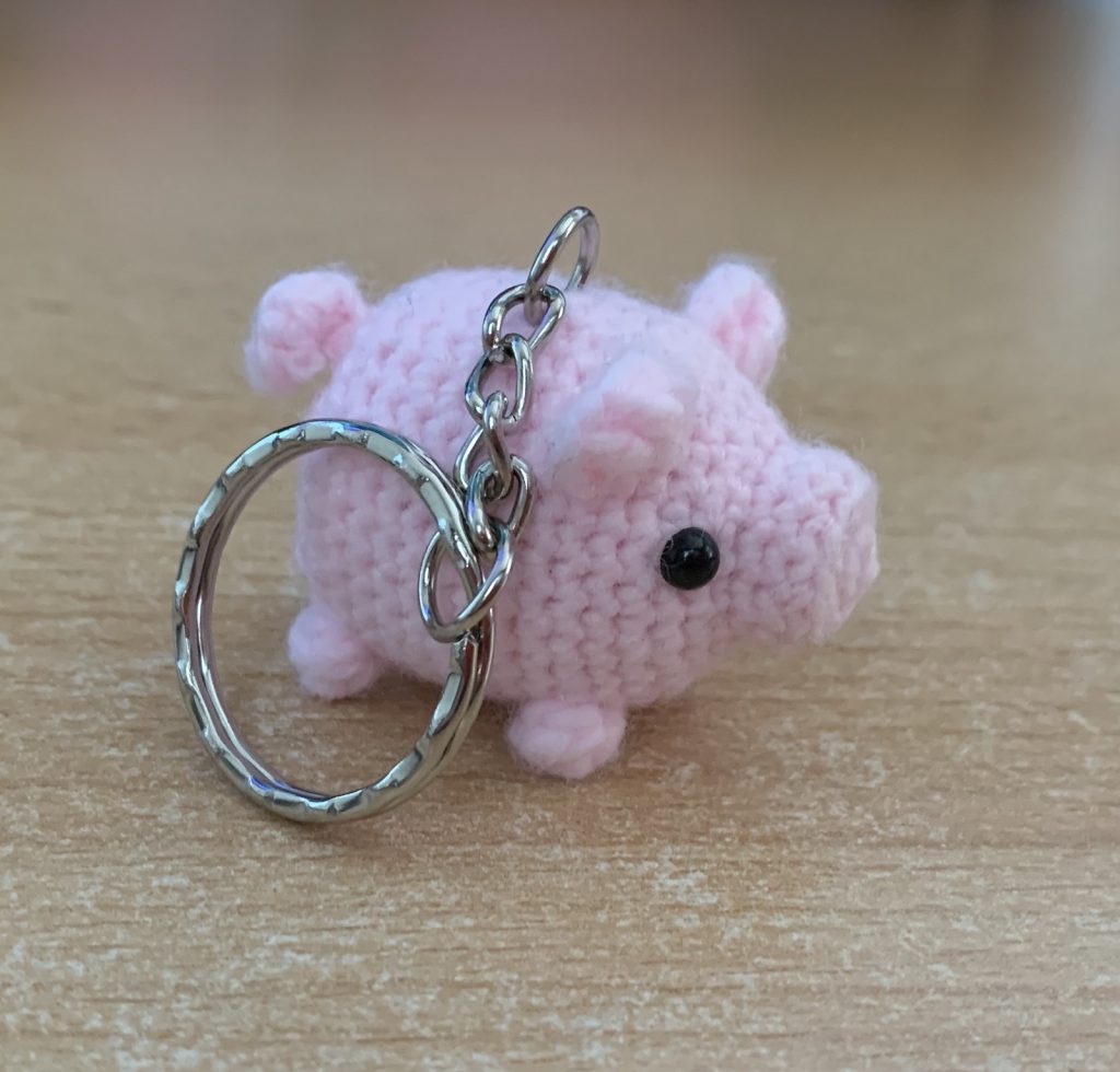 Learn how to easily create a Mini Amigurumi Pig with this one-piece free pattern that's perfect for gifting or as a cute keyring accessory. Quick and beginner-friendly!